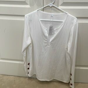 New with tags -White top, split neckline, a great summer staple